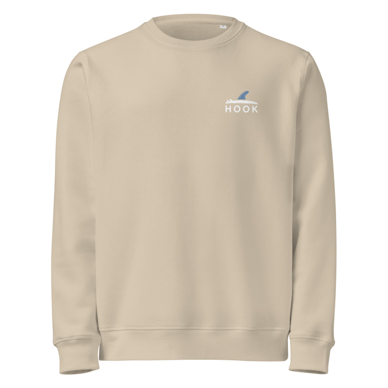 Sand-colored crewneck sweatshirt laid flat with HOOK text and blue fin graphic embroidered on left chest